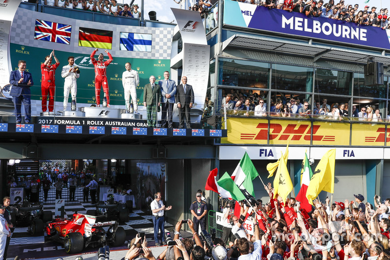 Luigi Fraboni, Head of Power Unit Race Operation, Ferrari, Lewis Hamilton, Mercedes AMG, 2nd Position, Sebastian Vettel, Ferrari, 1st Position, and Valtteri Bottas, Mercedes AMG, 3rd Position, on the podium