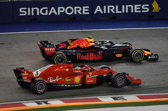 Sebastian Vettel, Ferrari SF71H and Max Verstappen, Red Bull Racing RB14 batttle