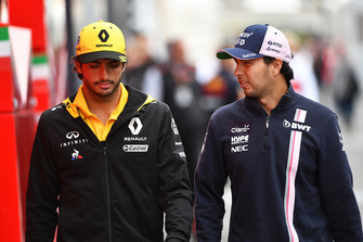 Carlos Sainz Jr., Renault Sport F1 Team and Sergio Perez, Racing Point Force India F1 Team