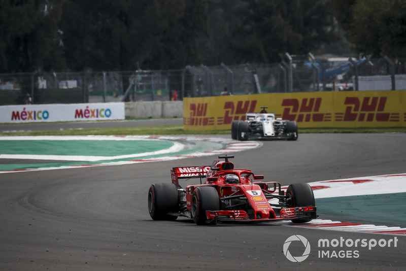 Sebastian Vettel, Ferrari SF71H and Marcus Ericsson, Sauber C37