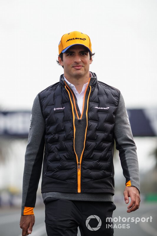 Carlos Sainz Jr., McLaren, walks the track