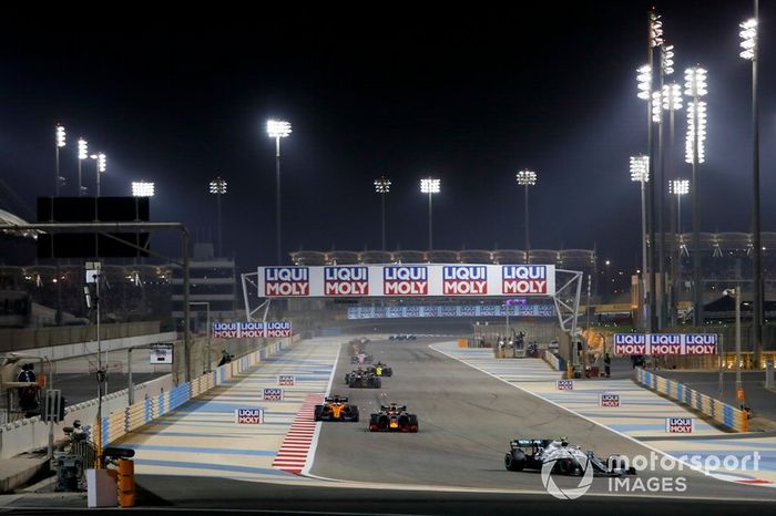 Valtteri Bottas, Mercedes AMG W10, leads Max Verstappen, Red Bull Racing RB15, and Carlos Sainz Jr., McLaren MCL34