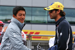 (L to R): Rio Haryanto, Manor Racing with Felipe Nasr, Sauber F1 Team on the drivers parade