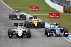 Felipe Massa, Williams FW38 and Marcus Ericsson, Sauber C35 battle for position