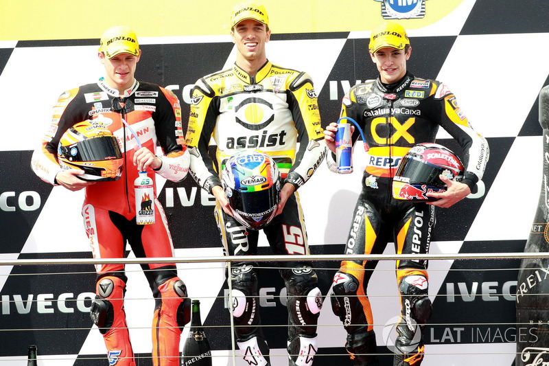 Podio: il secondo classificato Stefan Bradl, il vincitore della gara Alex De Angelis, il terzo classificato Marc Marquez