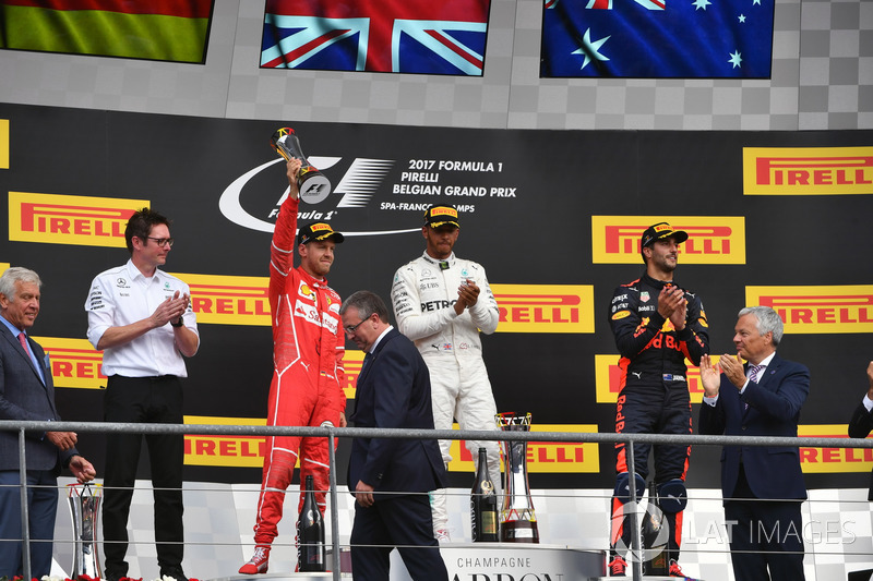 Andy Shovlin, Mercedes AMG F1 Engineer, Sebastian Vettel, Ferrari, Lewis Hamilton, Mercedes AMG F1 and Daniel Ricciardo, Red Bull Racing on the podium