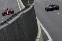Sebastian Vettel, Ferrari SF71H and Pierre Gasly, Scuderia Toro Rosso STR13