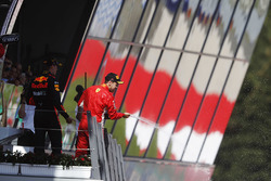Podium: third place Sebastian Vettel, Ferrari, sprays champagne on the podium, along with race winner Max Verstappen, Red Bull Racing