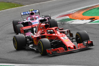 Sebastian Vettel, Ferrari SF71H and Esteban Ocon, Racing Point Force India VJM11