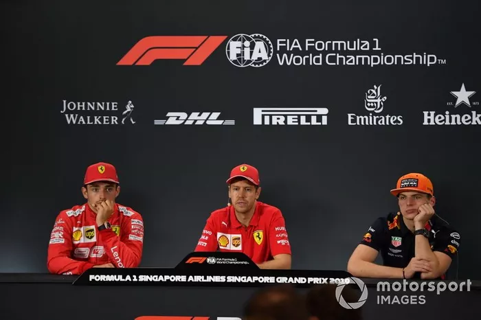 Charles Leclerc, Ferrari, 2nd position, Sebastian Vettel, Ferrari, 1st position, and Max Verstappen, Red Bull Racing, 3rd position, in the Press Conference