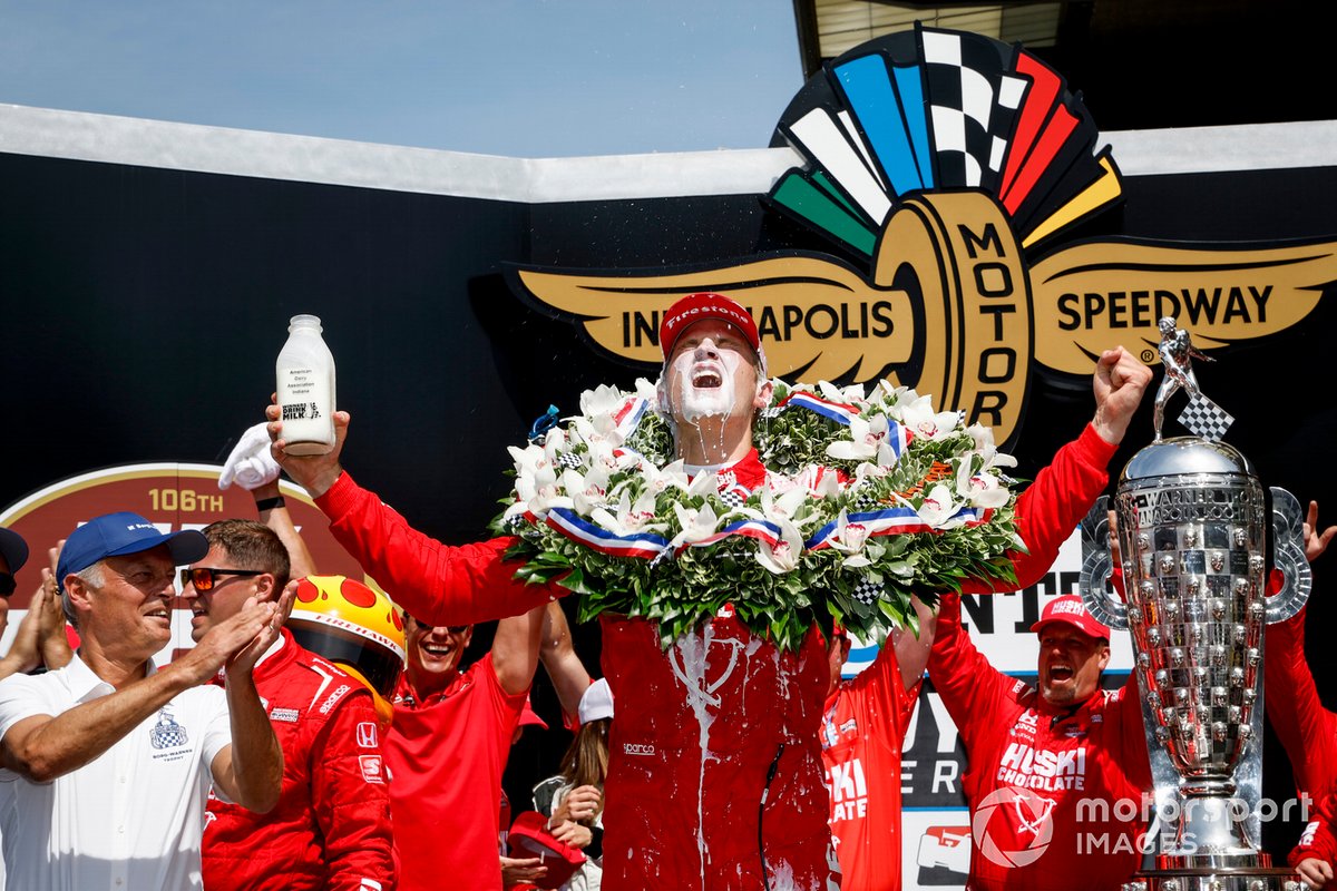 Ericsson enjoys the taste of milk in victory lane after becoming the second Swede to win the Indy 500