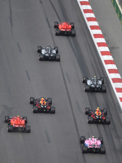 Sebastian Vettel, Ferrari SF71H leads at the start of the race