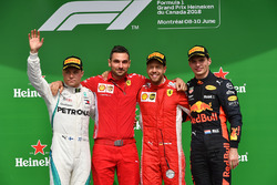 (L to R): Valtteri Bottas, Mercedes-AMG F1, Sebastian Vettel, Ferrari and Max Verstappen, Red Bull Racing celebrate on the podium