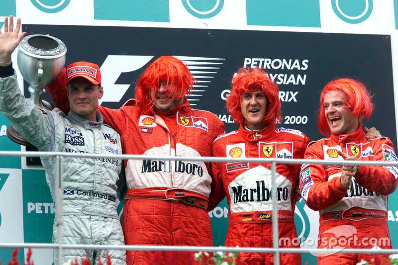 Podium : le second David Coutlhard, McLaren; Ross Brawn, Ferrari; le vainqueur Michael Schumacher, Ferrari; le troisième Rubens Barrichello, Ferrari