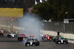 Lewis Hamilton, Mercedes AMG F1 W07 Hybrid locks up under braking as he leads at the start of the race