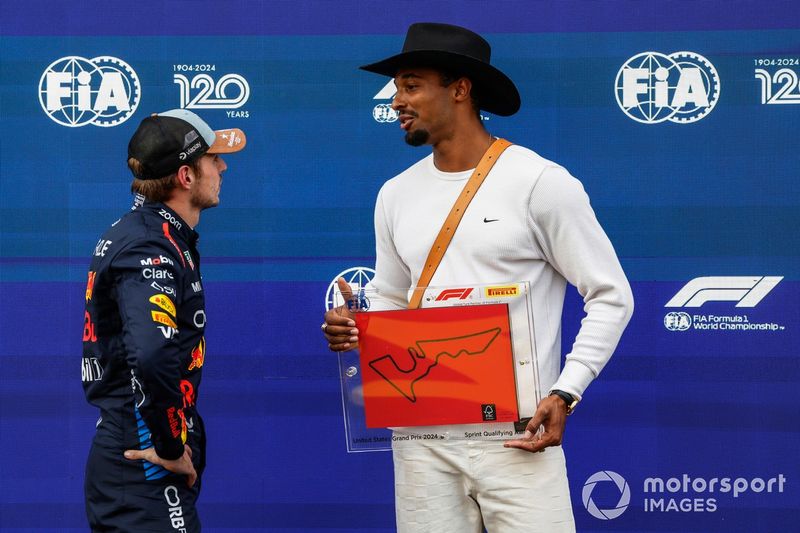 Max Verstappen, Red Bull Racing, receives his Sprint Qualifyiing Award from Leo Neugebauer, German Track and Field athlete