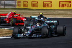 Lewis Hamilton, Mercedes AMG F1 W09, Valtteri Bottas, Mercedes AMG F1 W09, and Kimi Raikkonen, Ferrari SF71H