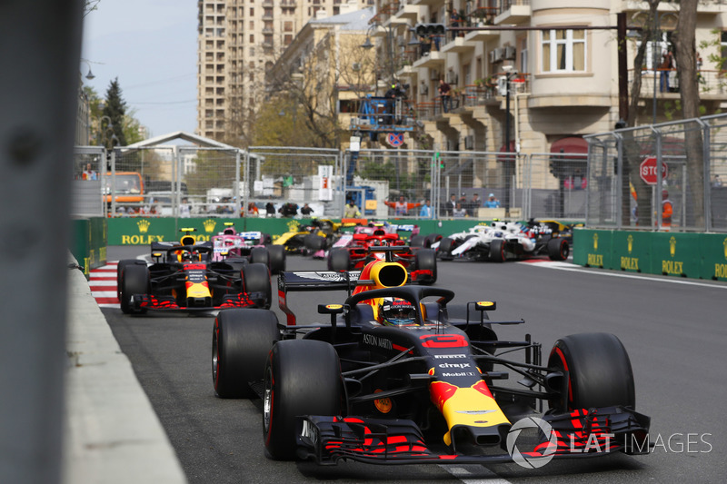 Daniel Ricciardo, Red Bull Racing RB14 Tag Heuer, leads Max Verstappen, Red Bull Racing RB14 Tag Heuer, Kimi Raikkonen, Ferrari SF71H, Esteban Ocon, Force India VJM11 Mercedes, Sergio Perez, Force India VJM11 Mercedes, and Carlos Sainz Jr., Renault Sport F1 Team R.S. 18, at the start