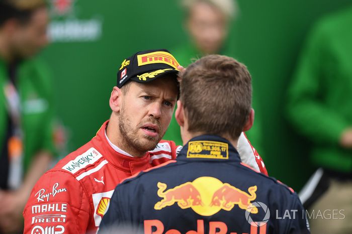 Sebastian Vettel, Ferrari y Max Verstappen, Red Bull Racing