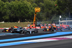 Lewis Hamilton, Mercedes-AMG F1 W09 leads at the start of the race as Sebastian Vettel, Ferrari SF71H hits Valtteri Bottas, Mercedes-AMG F1 W09
