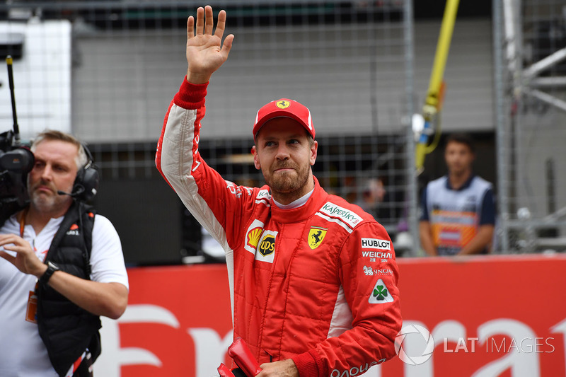Third place Sebastian Vettel, Ferrari celebrates in parc ferme
