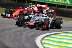 Romain Grosjean, Haas F1 Team VF-16 and Kimi Raikkonen, Ferrari SF16-H with Halo cockpit covers