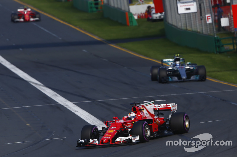 Sebastian Vettel, Ferrari SF70H, leads Valtteri Bottas, Mercedes AMG F1 W08, and Kimi Raikkonen, Ferrari SF70H