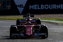 Kimi Raikkonen, Ferrari SF70H, leads Max Verstappen, Red Bull Racing RB13