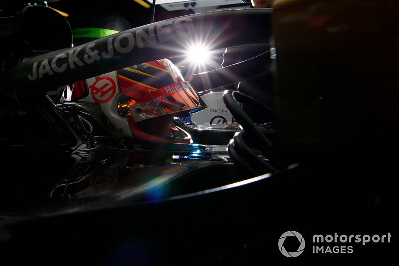 Kevin Magnussen, Haas F1 Team, in cockpit in the team's garage
