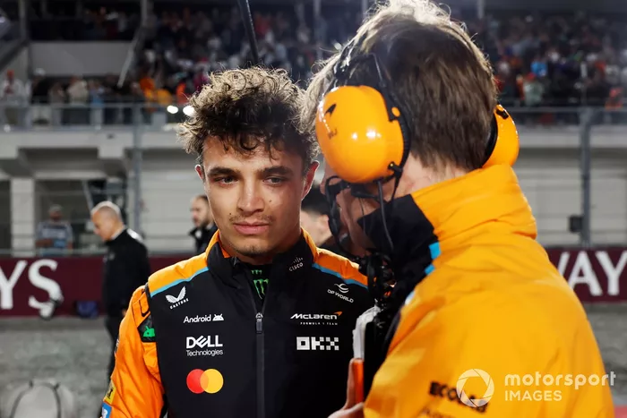 Lando Norris, McLaren F1 Team, on the grid with his engineer