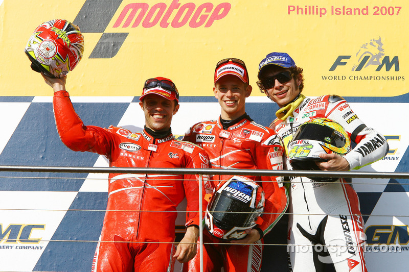 Podium: second place Loris Capirossi, Ducati; Race winner Casey Stoner; third place  Valentino Rossi