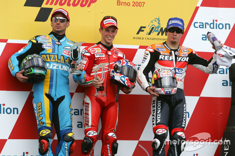 Podium: Race winner Casey Stoner, Ducati; second place John Hopkins, Suzuki; third place Nicky Hayde