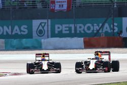 (L to R): Max Verstappen, Red Bull Racing RB12 battle for position with team mate Daniel Ricciardo, Red Bull Racing RB12