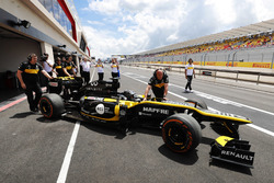 Aseel Al-Hamad, prepares to drive a 2012 Lotus E20 Renault F1 car in the Renault Passion Parade