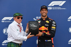 Pole sitter Daniel Ricciardo, Red Bull Racing receives the Pirelli Pole Position Award from Jackie Stewart