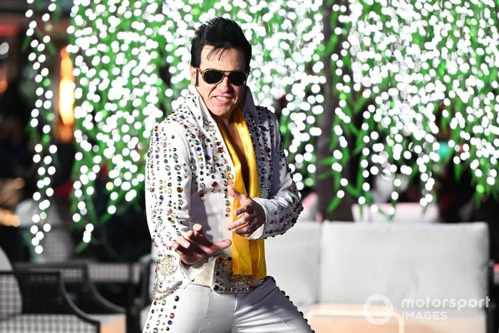 An Elvis impersonator in the paddock