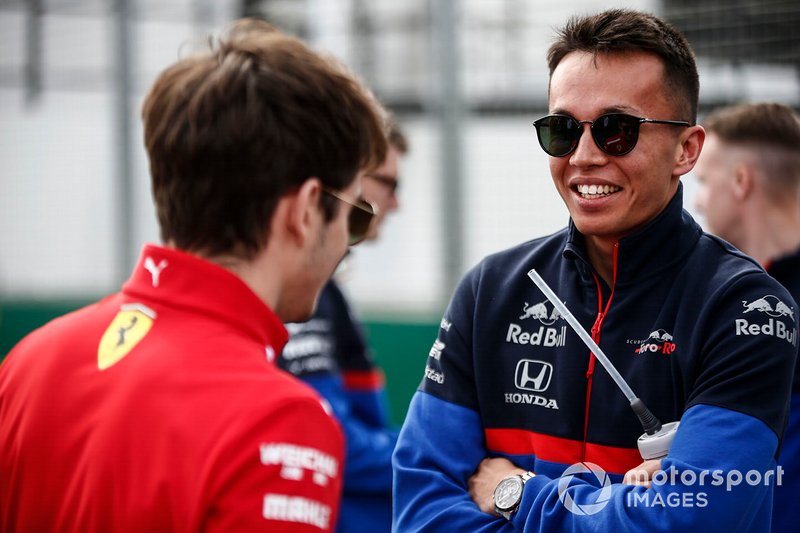 Charles Leclerc, Ferrari, and Alexander Albon, Scuderia Toro Rosso