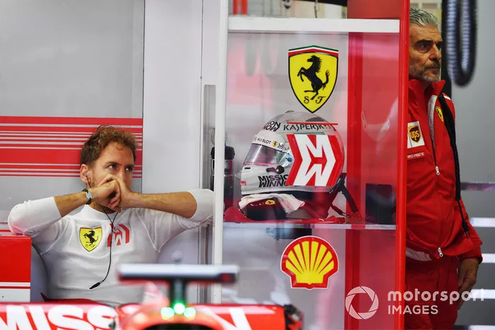 Sebastian Vettel, Ferrari y Maurizio Arrivabene, Director del Equipo Ferrari