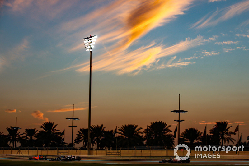 Fernando Alonso, McLaren MCL33, leads Charles Leclerc, Sauber C37, Carlos Sainz Jr., Renault Sport F1 Team R.S. 18, and Romain Grosjean, Haas F1 Team VF-18
