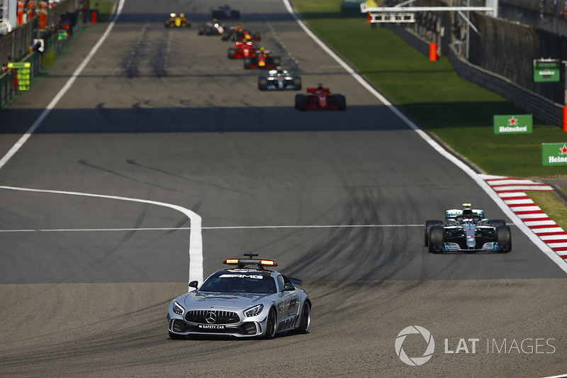 The AMG Mercedes safety-car leads Valtteri Bottas, Mercedes AMG F1 W09, Sebastian Vettel, Ferrari SF71H, Lewis Hamilton, Mercedes AMG F1 W09, and Max Verstappen, Red Bull Racing RB14 Tag Heuer