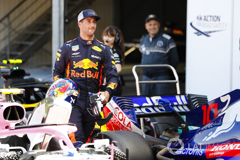 Daniel Ricciardo, Red Bull Racing, walks through parc ferme after setting pole position