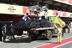 The car of Fernando Alonso, McLaren MCL33 is recovered to the pits