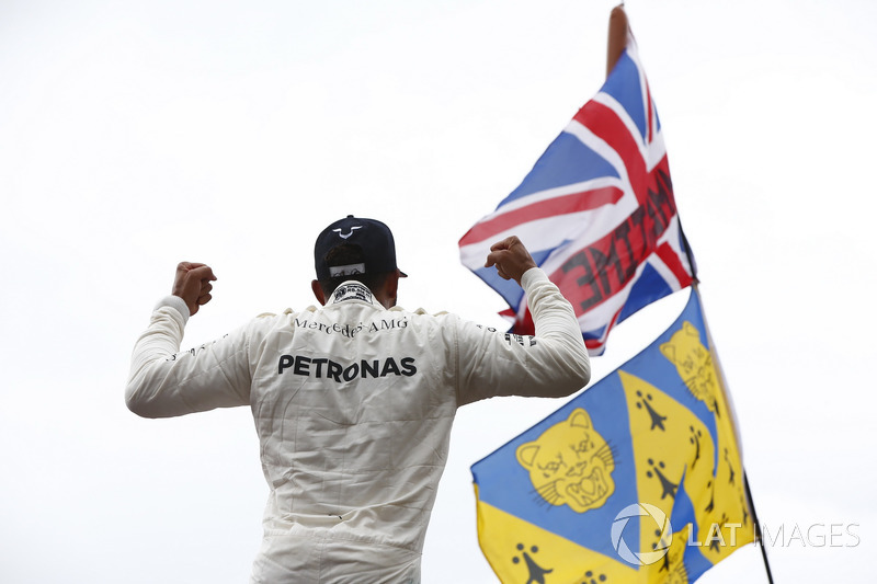 Race winner Lewis Hamilton, Mercedes AMG F1, celebrates with the fans