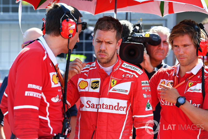 Sebastian Vettel, Ferrari, Riccardo Adami, Ferrari Race Engineer and Antti Kontsas, trainer