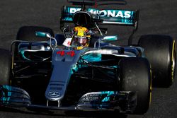 Lewis Hamilton, Mercedes AMG F1 W08, celebrates as he returns to the pits after winning the race