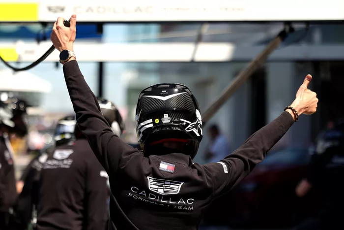 Cadillac F1 Team pit crew in the pit lane.