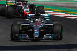 Lewis Hamilton, Mercedes AMG F1 W09, leads Kevin Magnussen, Haas F1 Team VF-18