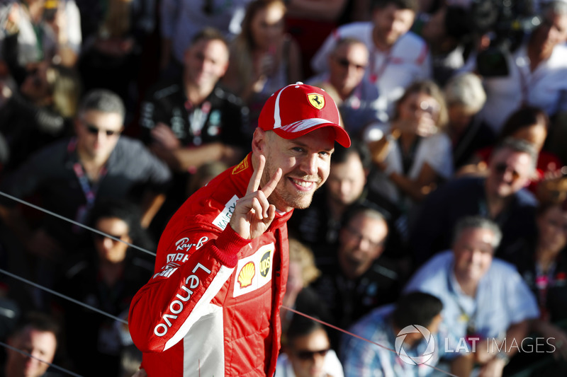 Sebastian Vettel, Ferrari, celebrates victory on the podium