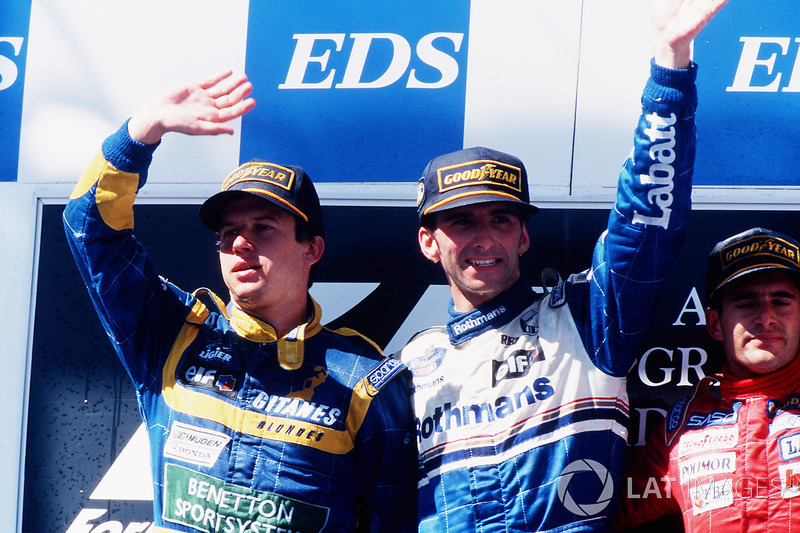 Podium: Race winner Damon Hill, Williams Renault, second place Olivier Panis, Ligier Mugen-Honda, third place Gianni Morbidelli, Footwork Hart