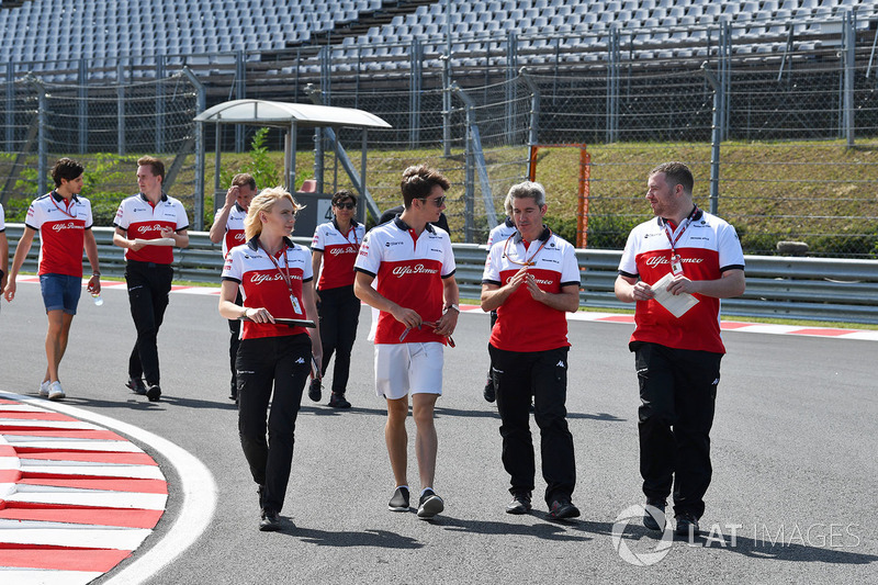 Charles Leclerc, Sauber walks the trackj with Ruth Buscombe, Sauber Race Strategist and Xevi Pujolar, Sauber Head of Track Engineering